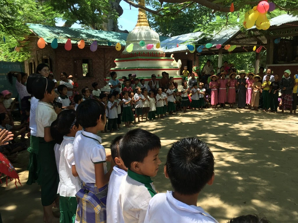 Children celebrating together at a village school in Myanmar